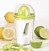 A kitchen tool with lemons and limes, demonstrating its dual function as a juicer and spiralizer. Produktbild-Vorschau