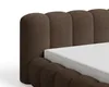 Close-up view of a brown upholstered bed frame with a white mattress. Voir les images du produit