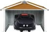 A robotic lawnmower is parked inside a protective garage structure. Náhľad obrázku produktu