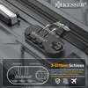 A close-up of a black KESSER luggage combination lock on a textured gray suitcase. Produktbild-Vorschau