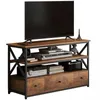 A TV stand with a television and various electronic devices on it. Podgląd zdjęcia produktu