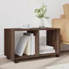 A brown wooden cabinet with wheels, containing books and a vase with flowers on top. Náhled obrázku produktu