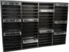 A black rack with multiple empty slots, some with clear plastic inserts. Produktbild-Vorschau