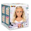 The image shows the retail packaging of a Smoby My Beauty Frisierkopf Blond styling head, along with some of its accessories. Náhled obrázku produktu