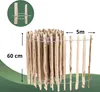 A rolled-up wooden fence with dimensions indicated. Produktbild-Vorschau