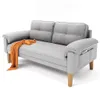 A light gray sofa with an orange throw blanket draped over the armrest, set against a white background. Produktbild-Vorschau