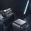 Two car chargers are displayed on a dark, angled surface with a bright light source in the background. Produktbild-Vorschau