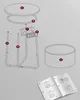 An exploded view diagram of a side table with labeled parts and an open instruction manual. Produktbild-Vorschau