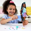 Barbie Totally Hair Poupée au look papillon, cheveux longs Voir les images du produit 15