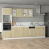 A modern kitchen setup with light wood cabinets and appliances. Produktbild-Vorschau