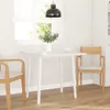A white dining table with two chairs in a bright room with a window. Náhled obrázku produktu