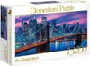 A Clementoni puzzle box featuring a nighttime view of the Brooklyn Bridge and the New York City skyline. Podgląd zdjęcia produktu