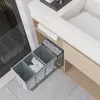 A built-in trash sorting system with three compartments is pulled out from under a countertop in a modern bathroom or kitchen. Náhľad obrázku produktu