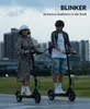 Two people riding electric scooters in a city park at dusk. Produktbild-Vorschau