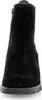 A close-up view of the back of a black suede boot with a platform sole. Produktbild-Vorschau