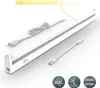 A white LED under-cabinet light with a power cord and an extension cable. Náhľad obrázku produktu