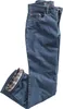 A pair of folded blue jeans with a plaid lining visible at the cuff.
