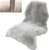 A light gray faux fur rug is shown against a white background. A small inset image shows a ruler measuring the pile height of white faux fur. Náhled obrázku produktu