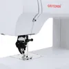 Close-up of the needle and presser foot of a white sewing machine. Produktbild-Vorschau