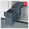 A pull-out trash bin system installed inside a cabinet. Produktbild-Vorschau