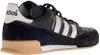 A side view of a black Adidas Mundial Goal sneaker. Anteprima dell’immagine prodotto
