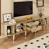 A TV stand with a television on top, in a living room setting. Anteprima dell’immagine prodotto