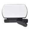 A close-up studio shot of a smartphone camera reflection mirror with a clip. Voir les images du produit