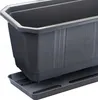 A close-up view of a dark gray planter pot sitting on a matching tray, against a white background. Podgląd zdjęcia produktu