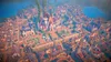 An aerial view of a stylized, fantasy-style city with a large castle at its center. Produktbild-Vorschau