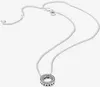 A silver necklace with a circular pendant is displayed against a white background. Anteprima dell’immagine prodotto