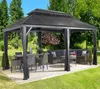 A gazebo set up in a backyard with outdoor furniture. Náhľad obrázku produktu
