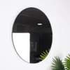 Elegantní kulaté nástěnné zrcadlo s černým kovovým rámem Náhled obrázku produktu 5
