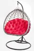 A hanging egg chair with a red cushion, displayed against a white background. Produktbild-Vorschau