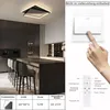 A modern kitchen with a ceiling light and a close-up of a light switch and remote control. Náhľad obrázku produktu