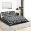 A bedroom scene with a bed, nightstand, plant, and artwork. Produktbild-Vorschau