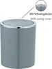 A grey trash can with a silver swing lid, shown against a white background. A close-up inset highlights the swing lid feature. Produktbild-Vorschau