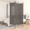A room divider is placed in front of a bed in a bedroom. Náhľad obrázku produktu