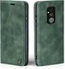 A green flip case for a Huawei Mate 20 Lite phone is shown from two angles. Produktbild-Vorschau