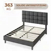 A dark gray upholstered bed frame with a tufted headboard and a wooden slat support system, shown from a diagonal front-left perspective against a white background. Text overlays indicate product features and specifications. Produktbild-Vorschau