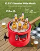 A red beverage dispenser filled with ice and beer bottles, placed on a wooden table outdoors. Produktbild-Vorschau