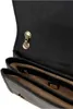 Close-up view of the interior of an open black handbag, showing compartments and the Guess logo. Produktbild-Vorschau