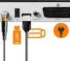 Close-up view of various electronic connectors and cables, with icons and labels indicating their function. Produktbild-Vorschau