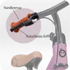 Close-up of a bicycle's handlebars and seat, with labels pointing out features. Produktbild-Vorschau