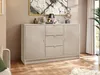 A sandbeige sideboard with fluted doors and drawers, decorated with a lamp, vases, and a sculpture, placed in a room with a painting on the wall and a plant in the background. Anteprima dell’immagine prodotto