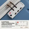 A close-up of a TSA-certified combination lock on a blue suitcase. Náhľad obrázku produktu