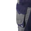 A close-up view of a pair of navy and gray work pants, showing a cargo pocket. Produktbild-Vorschau