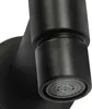A close-up view of a black faucet's aerator. Podgląd zdjęcia produktu