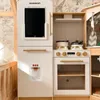 A child's play kitchen set is shown in a room with animal-themed wallpaper. Podgląd zdjęcia produktu