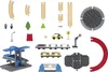 A collection of toy train set pieces laid out on a white background. Podgląd zdjęcia produktu