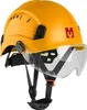 A yellow safety helmet with a clear visor and black straps, presented against a white background. Produktbild-Vorschau